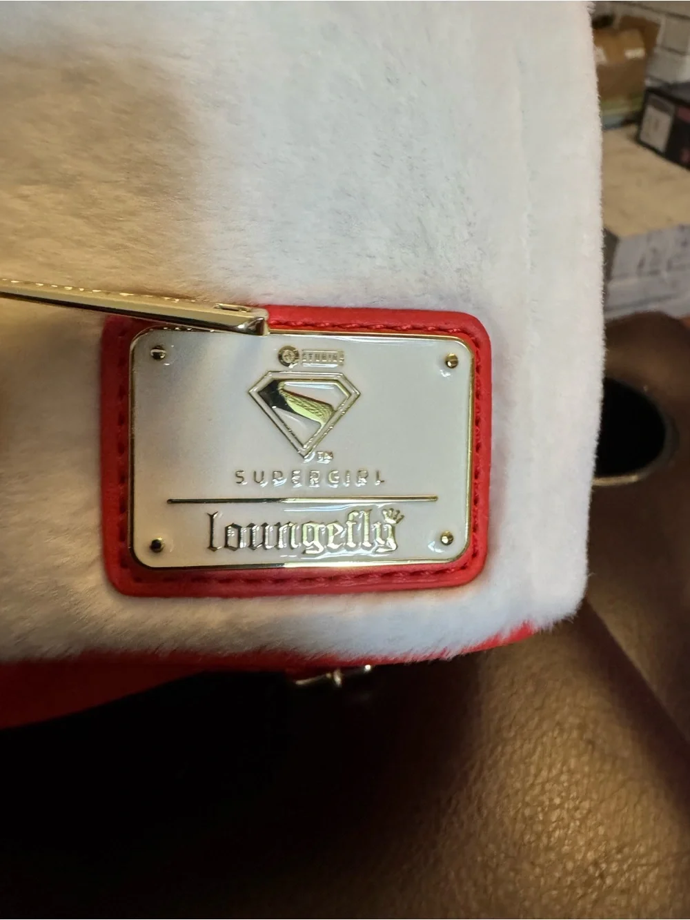 Loungefly White Dog Face Mini Backpack with Red and Yellow Accents Supergirl
